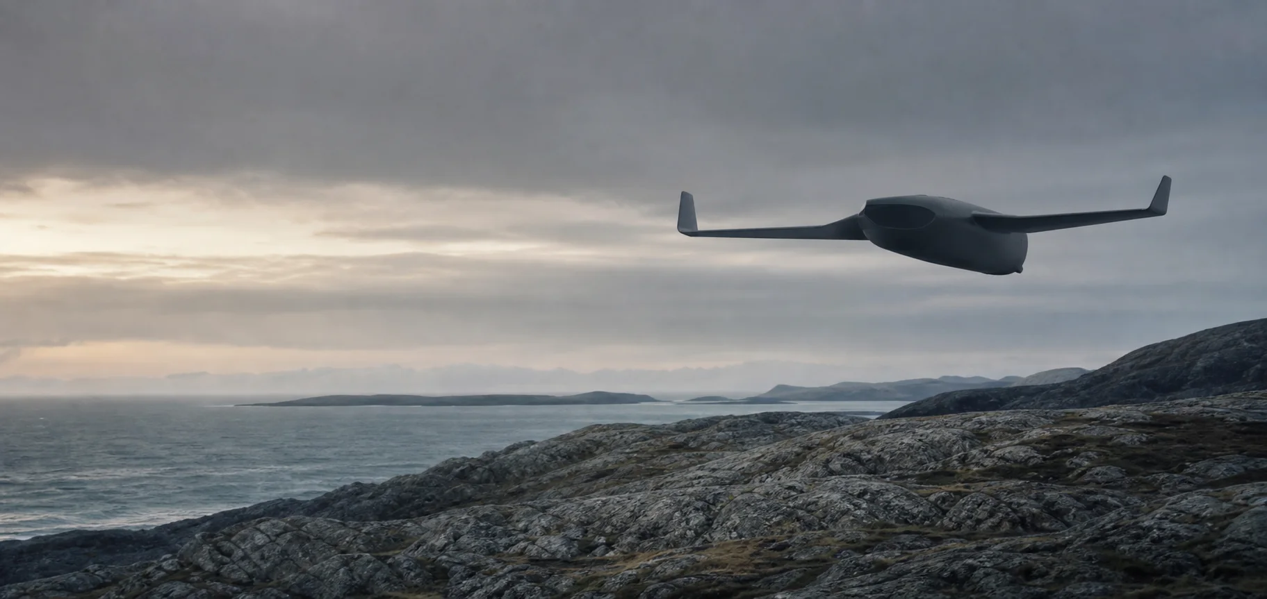Unmanned aircraft flying above a rocky coastline.